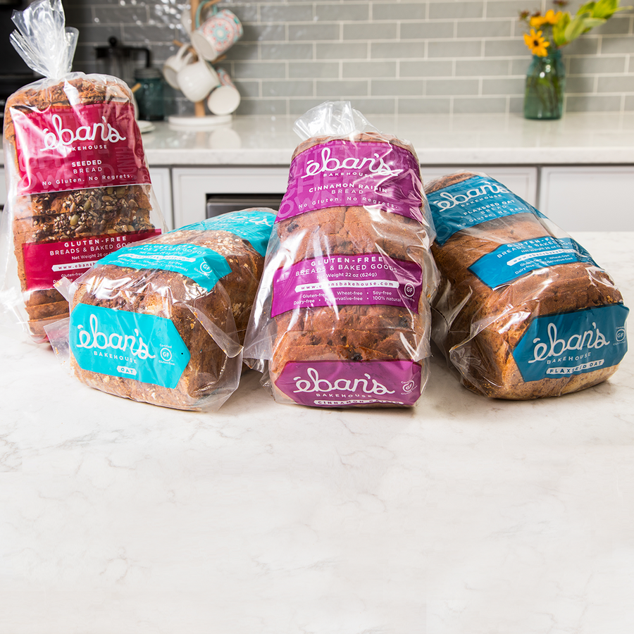 All four varieties of gluten-free bread from Éban's Bakehouse in packaging on kitchen counter